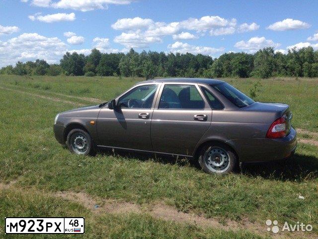 Фото автомобиля LADA 2170 PRIORA, 2015 — госномер А755ЕС136. Цвет: Золотисто-коричневый