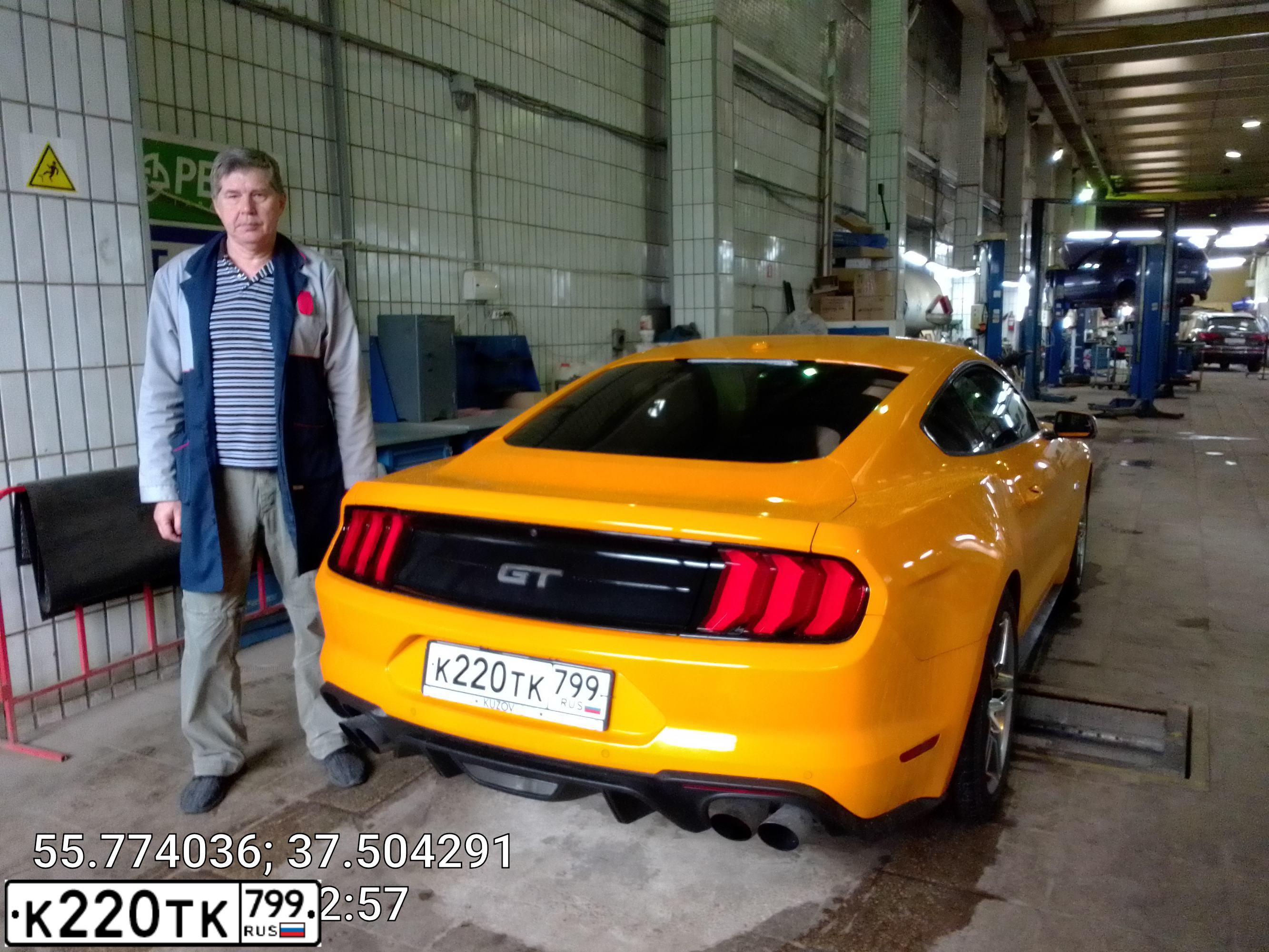 Фото автомобиля FORD MUSTANG, 2018 — госномер К220ТК799. Цвет: Оранжевый