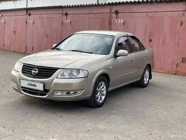 Фото автомобиля NISSAN ALMERA, 2007 — госномер Т136ВР199. Цвет: БЕЖЕВЫЙ