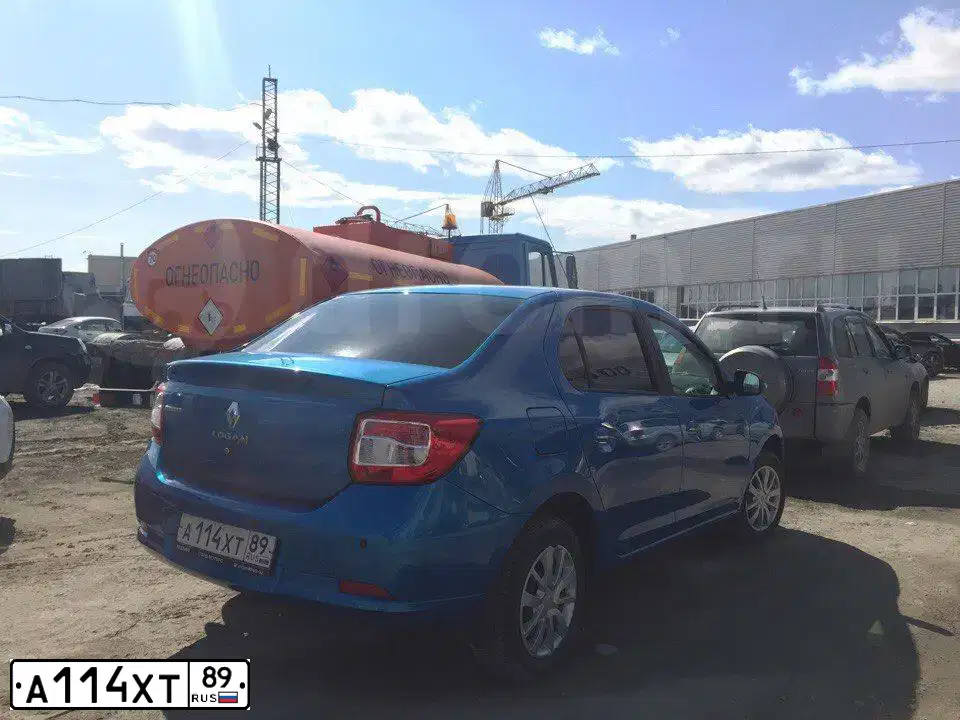 Фото автомобиля RENAULT LOGAN, 2014 — госномер А114ХТ89. Цвет: СВЕТЛО-СИНИЙ
