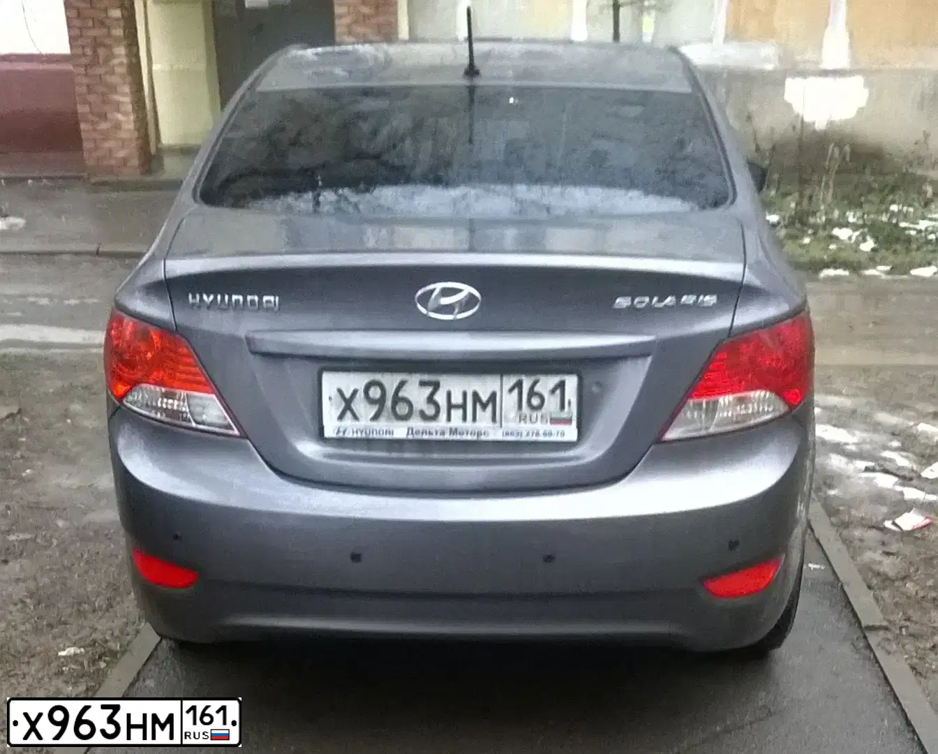 Фото автомобиля HYUNDAI SOLARIS, 2011 — госномер Х963НМ161. Цвет: ЧЕРНО-СЕРЫЙ