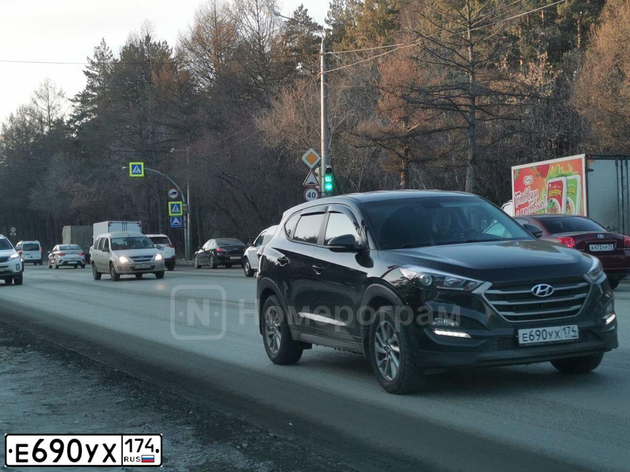 Фото автомобиля HYUNDAI TUCSON, 2016 — госномер Е690УХ174. Цвет: ЧЕРНЫЙ