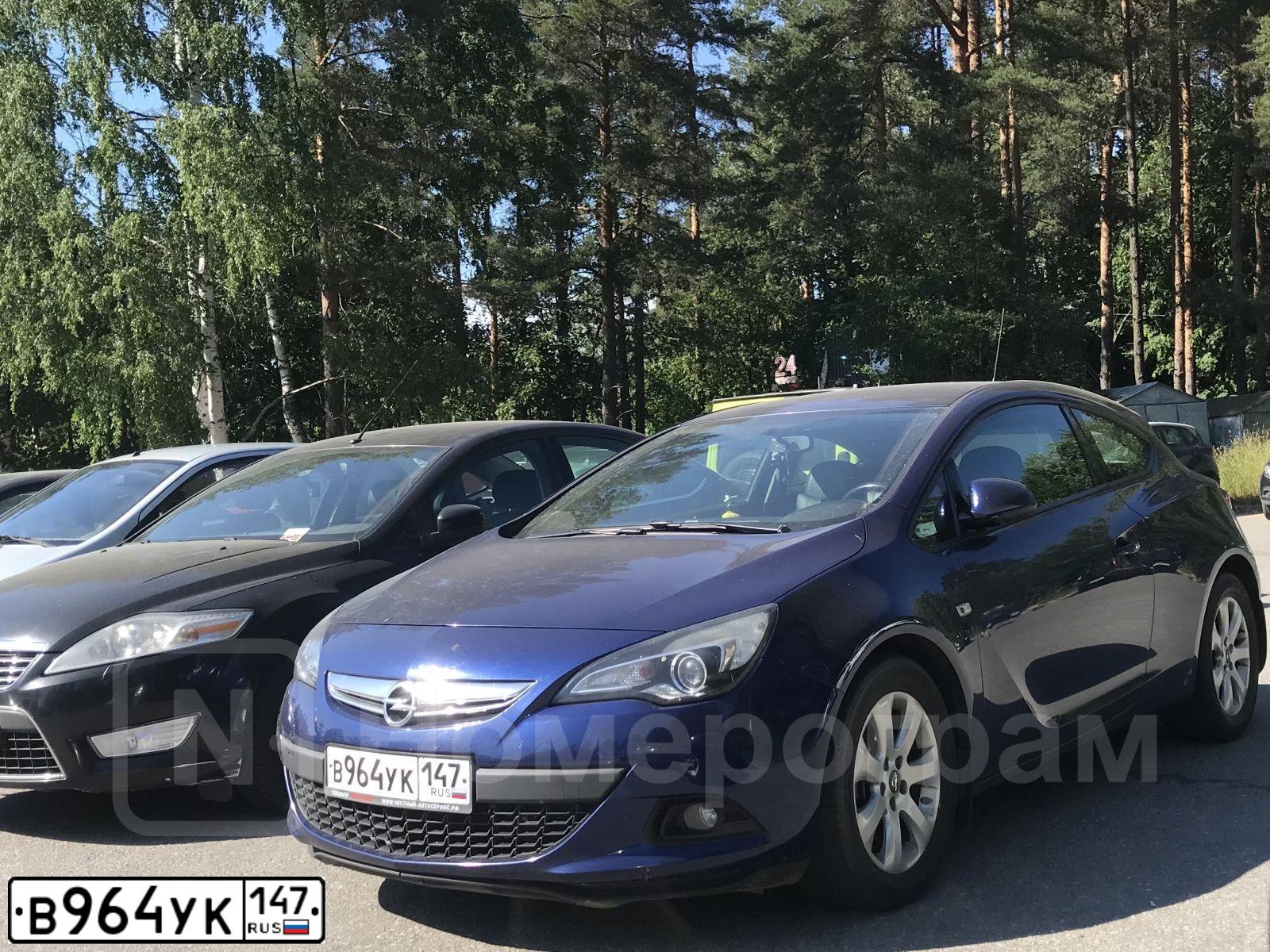 Фото автомобиля OPEL ASTRA, 2014 — госномер В964УК147. Цвет: синий