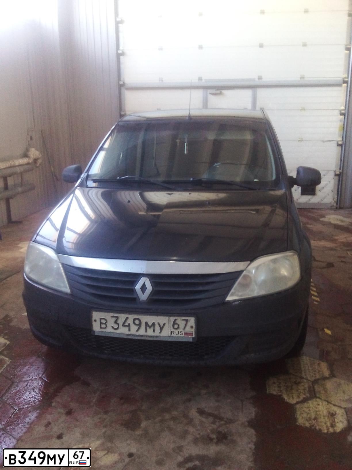 Фото автомобиля RENAULT LOGAN, 2012 — госномер Н117СЕ134. Цвет: ЧЕРНЫЙ
