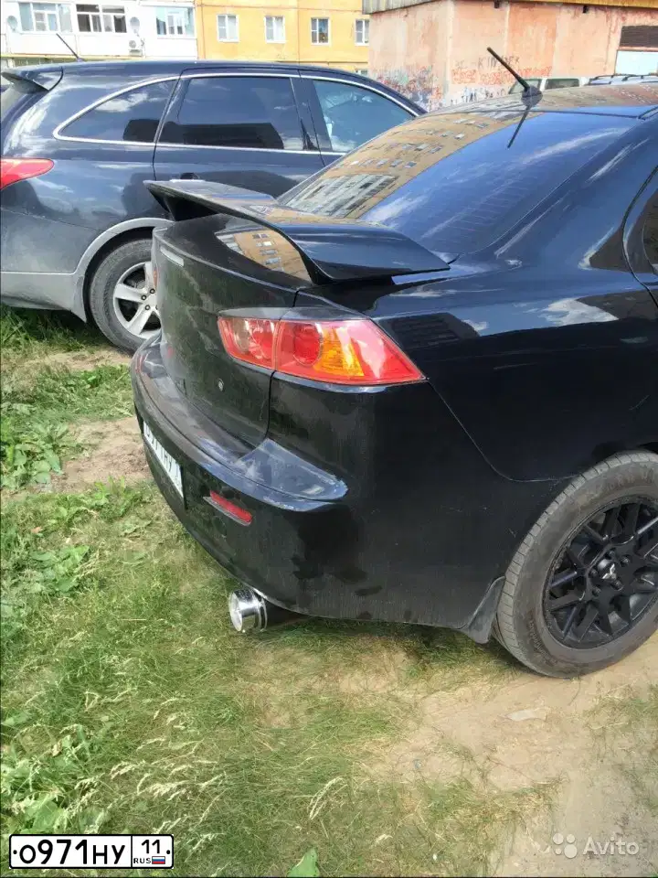 Фото автомобиля MITSUBISHI LANCER, 2008 — госномер Е300ВХ11. Цвет: ЧЕРНЫЙ