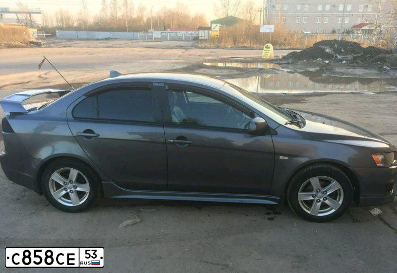 Фото автомобиля MITSUBISHI LANCER, 2007 — госномер С858СЕ53. Цвет: Серый