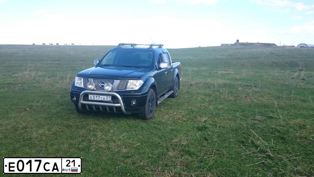 Фото автомобиля NISSAN NAVARA, 2008 — госномер М365КТ799. Цвет: ЧЕРНЫЙ
