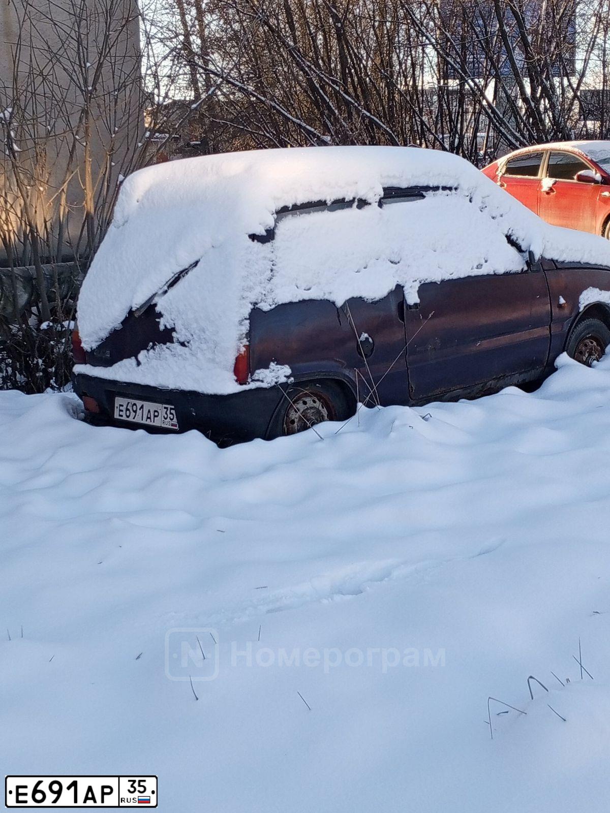 Фото автомобиля SEAZ OKA, 2001 — госномер Е691АР35. Цвет: БАКЛАЖАН