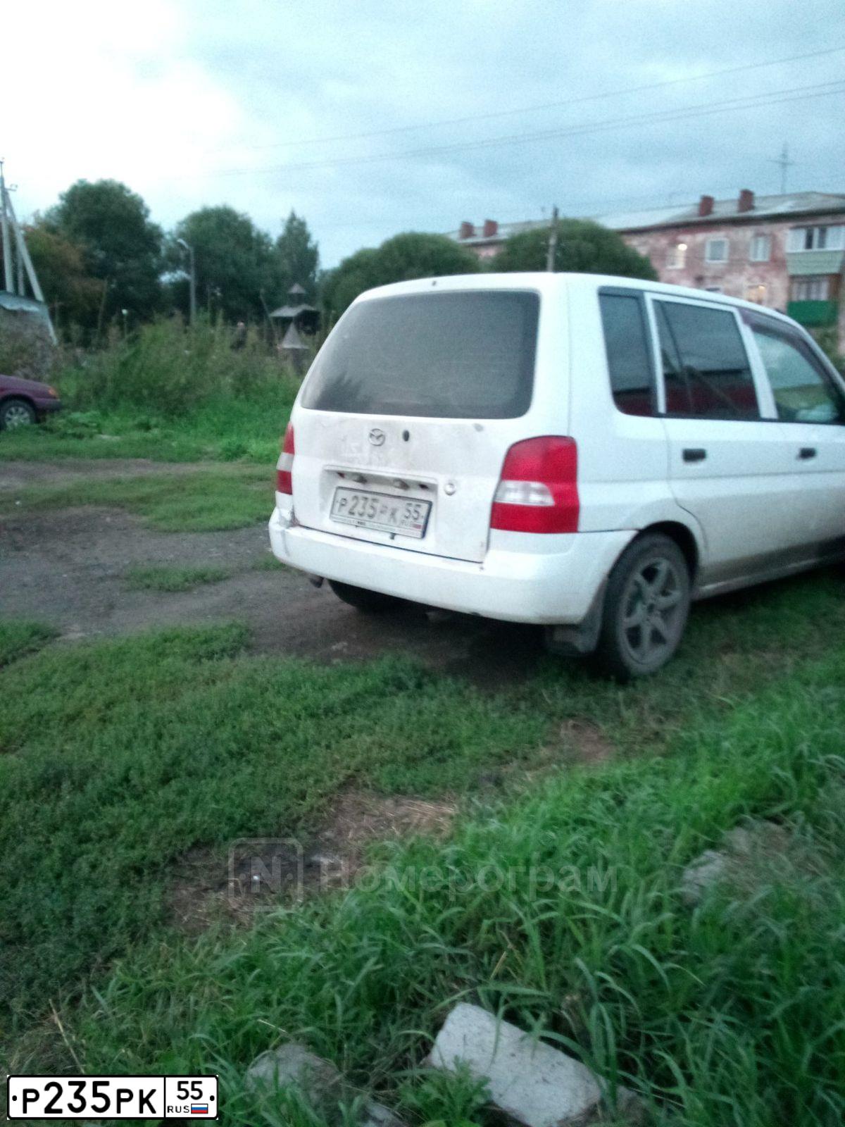 Фото автомобиля LADA 2107, 2001 — госномер Р235РК55. Цвет: ЯРКО-БЕЛЫЙ