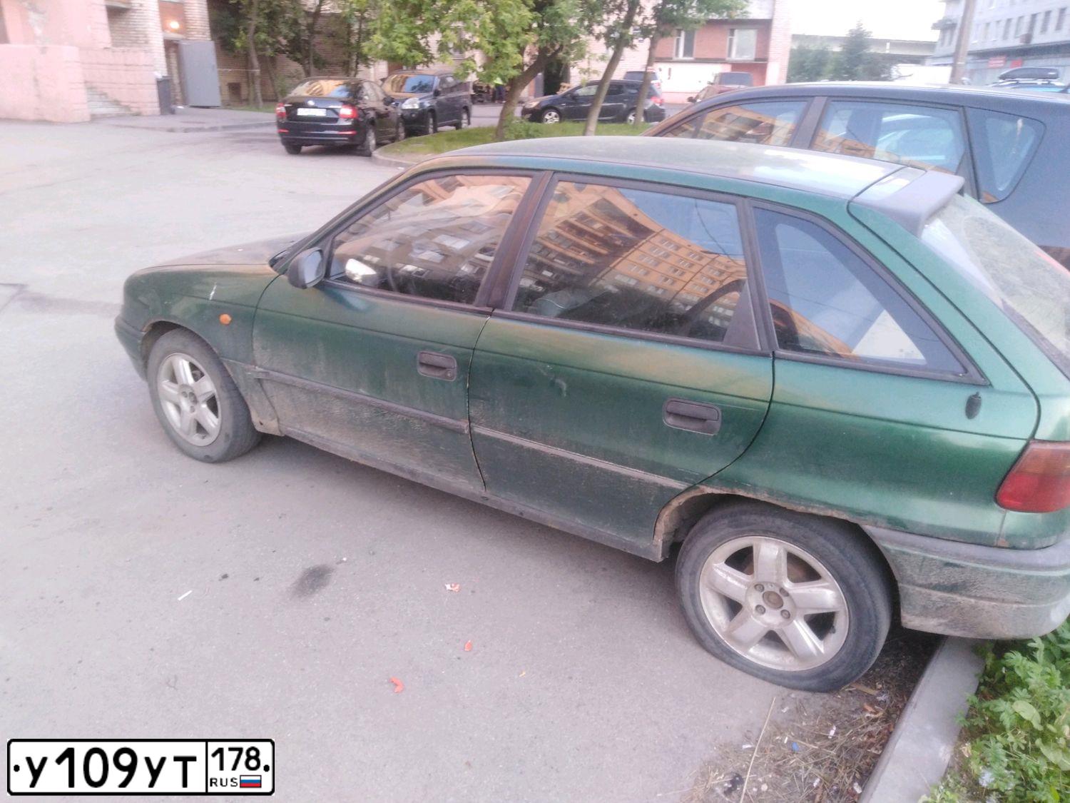 Фото автомобиля ОПЕЛЬ ASTRA, 1997 — госномер Н335МО198. Цвет: ЗЕЛЕНЫЙ