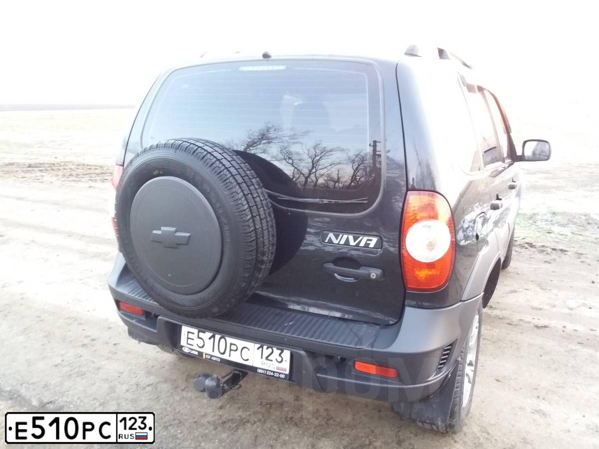 Фото автомобиля CHEVROLET NIVA, 2014 — госномер Е510РС123. Цвет: ЧЕРНО-СИНИЙ МЕТАЛЛИК