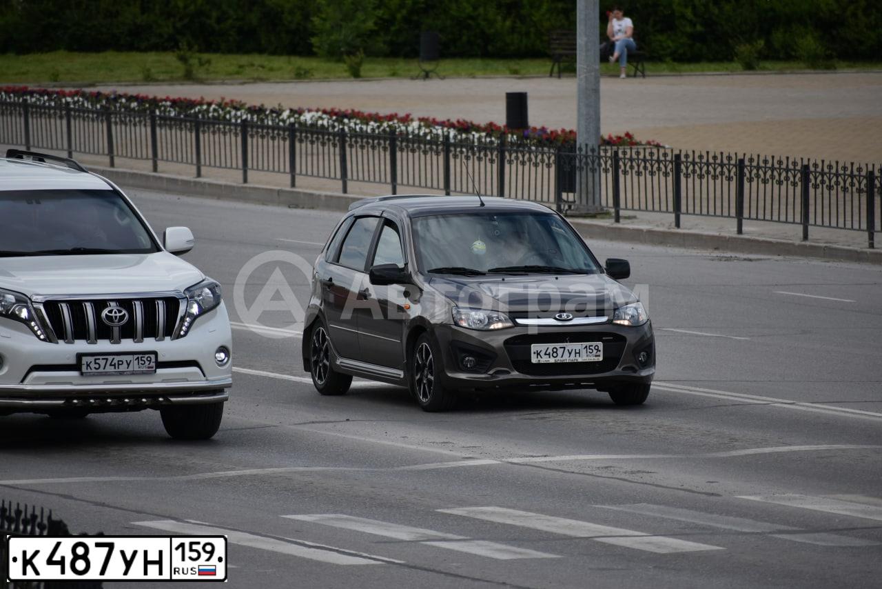 Фото автомобиля LADA 2192 KALINA, 2017 — госномер К487УН159. Цвет: Золотисто-коричневый