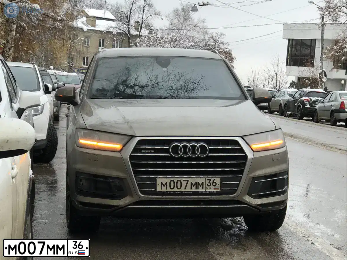 Фото автомобиля AUDI Q7, 2012 — госномер Е377КХ36. Цвет: Коричневый