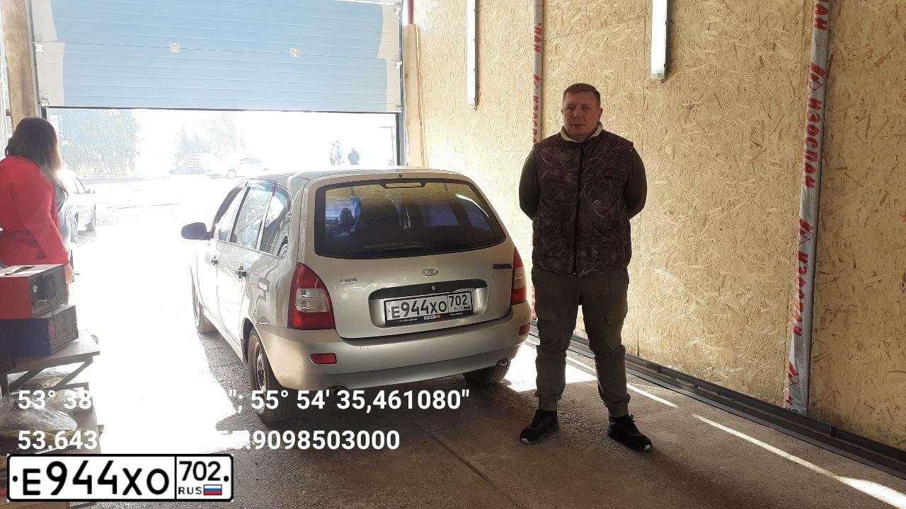 Фото автомобиля LADA KALINA, 2008 — госномер М702УМ702. Цвет: Серебристый