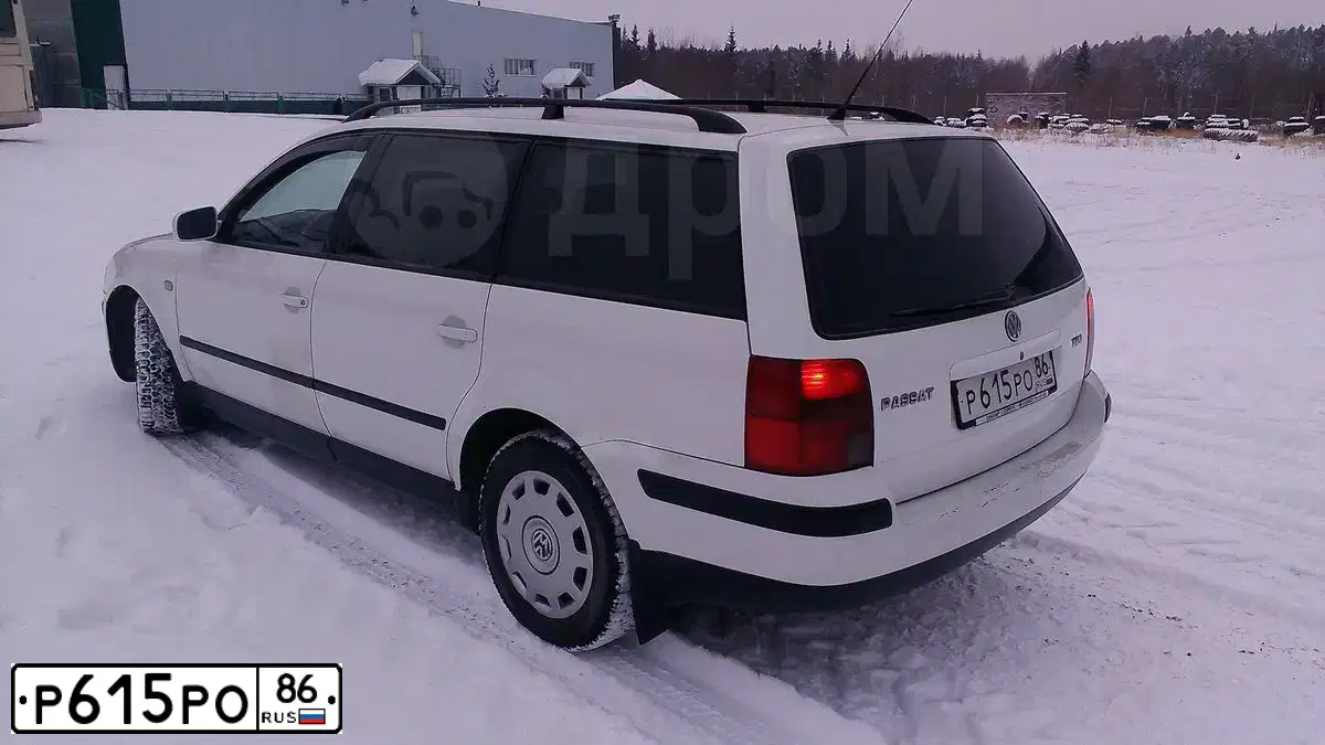 Фото автомобиля VOLKSWAGEN PASSAT, 1997 — госномер Р615РО86. Цвет: Белый