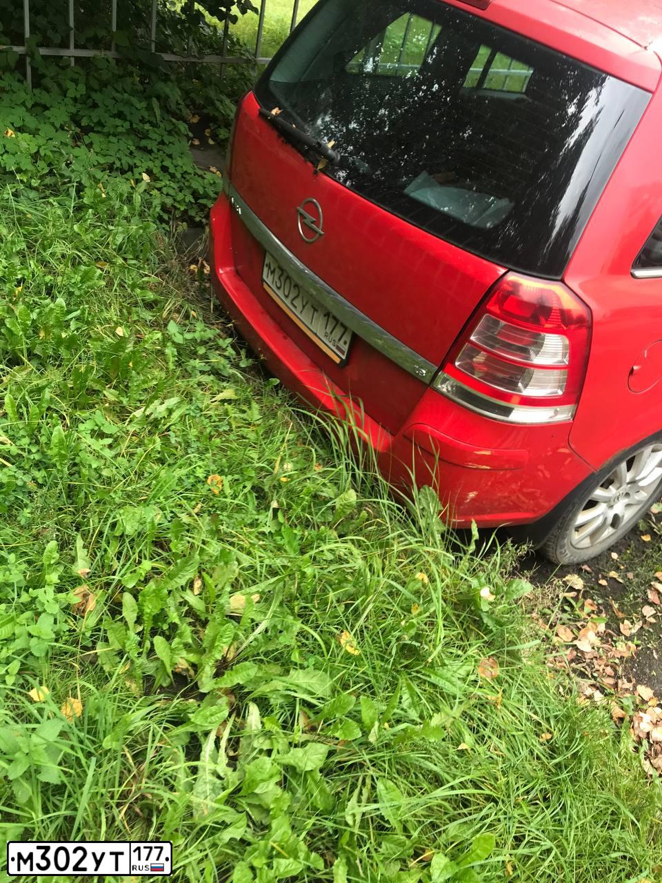 Фото автомобиля OPEL ZAFIRA, 2007 — госномер М302УТ177. Цвет: Красный