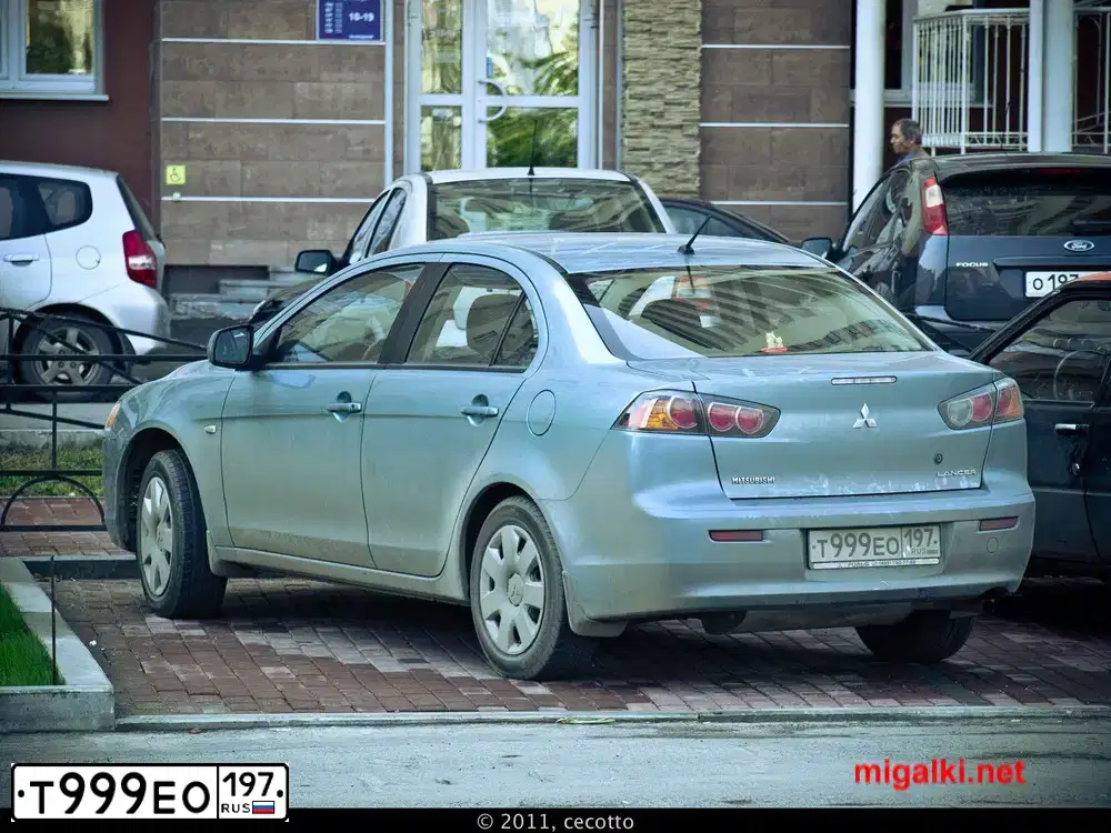 Фото автомобиля MITSUBISHI LANCER, 2010 — госномер Т794ЕЕ750. Цвет: СЕРО-ЗЕЛЕНЫЙ