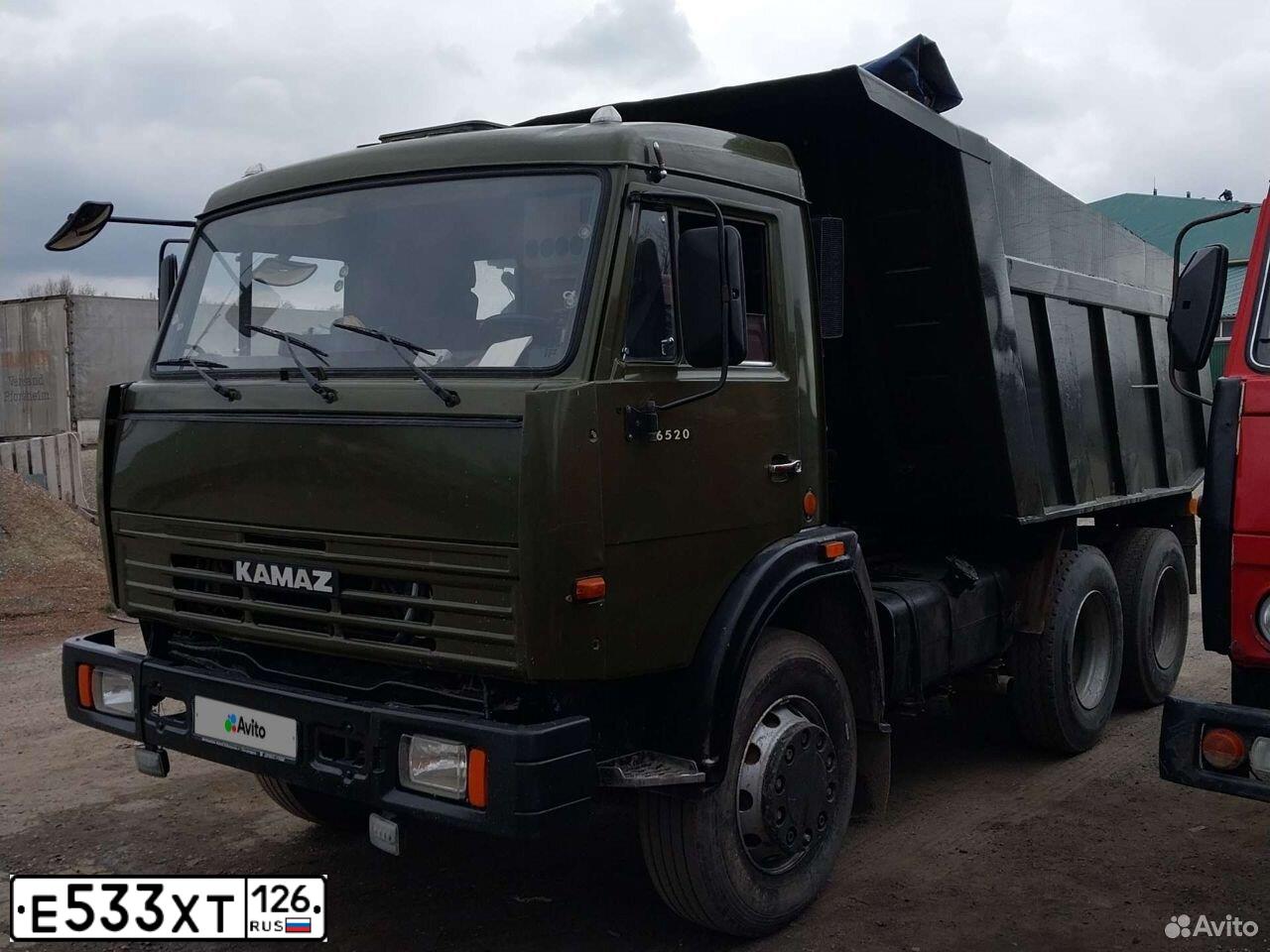Фото автомобиля KAMAZ 65115 /6X4/, 2000 — госномер Е533ХТ126. Цвет: Темно-зеленый