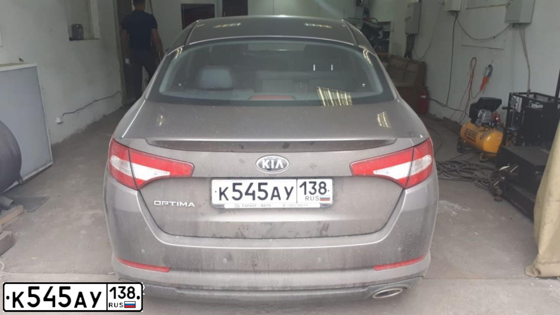 Фото автомобиля KIA MAGENTIS / OPTIMA, 2013 — госномер К545АУ138. Цвет: Коричневый