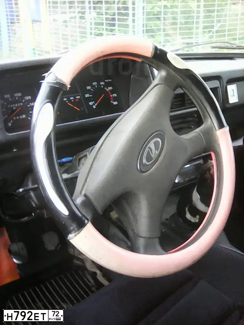 Фото автомобиля LADA 2346 WIS, 2005 — госномер А178ТН186. Цвет: ЯРКО-БЕЛЫЙ