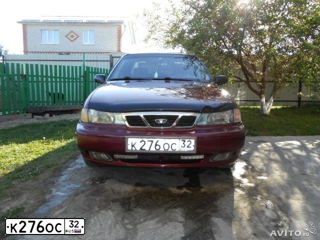 Фото автомобиля DAEWOO NEXIA, 2005 — госномер М817ОС40. Цвет: СПЕЛАЯ ВИШНЯ