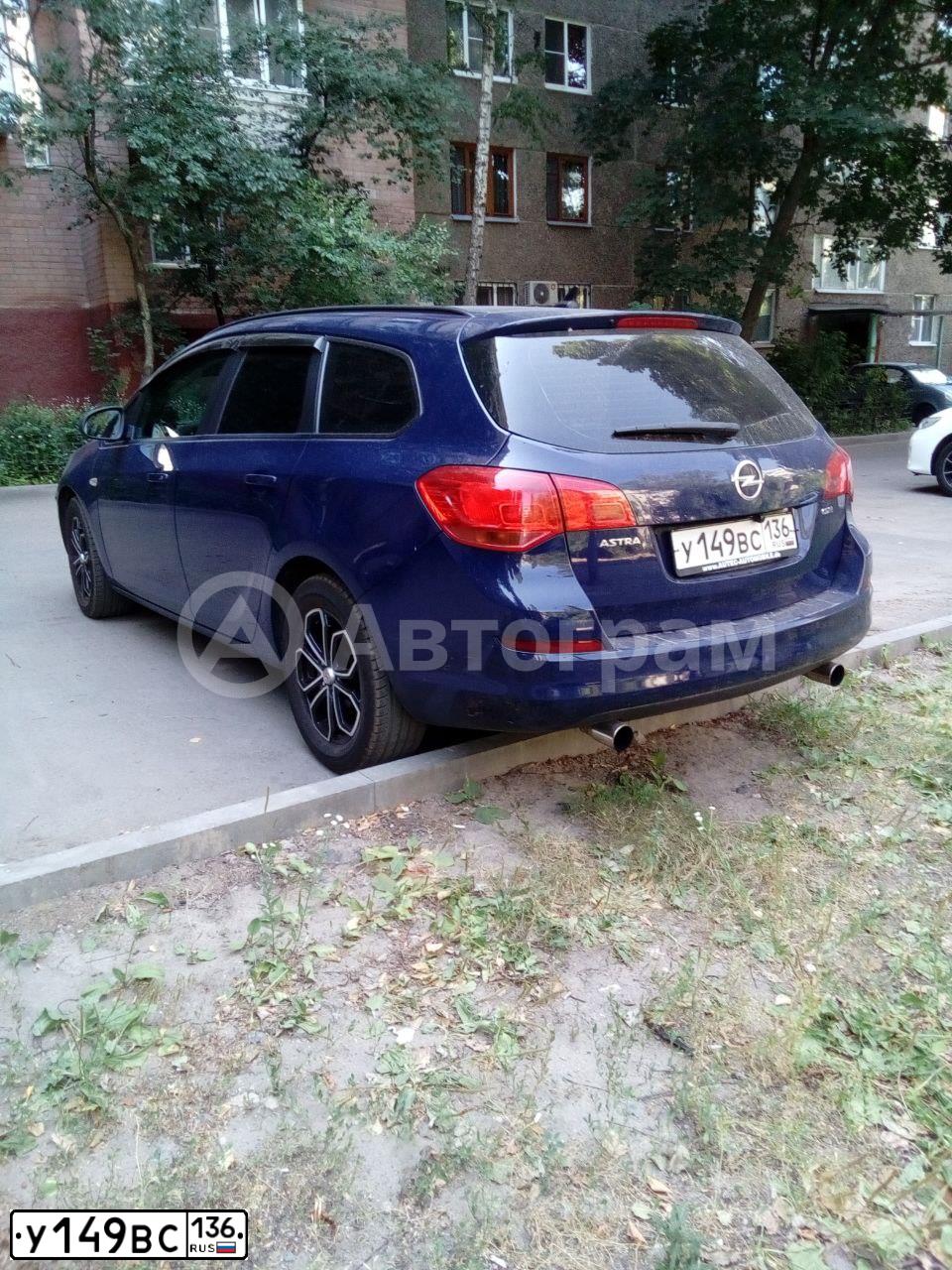 Фото автомобиля OPEL ASTRA, 2011 — госномер У149ВС136. Цвет: СИНИЙ