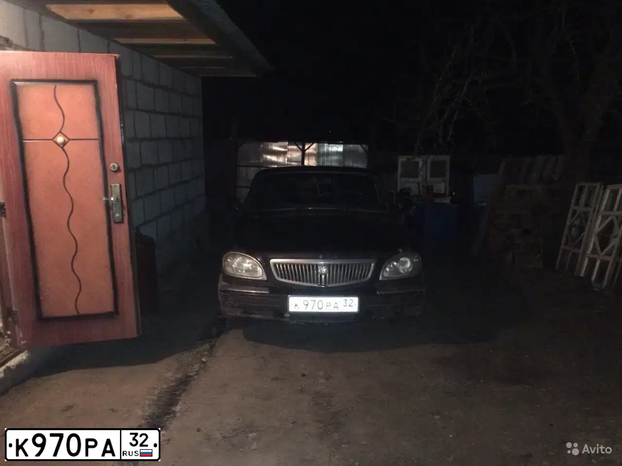 Фото автомобиля GAZ 3110 WOLGA, 2005 — госномер К970РА32. Цвет: ЧЕРНЫЙ