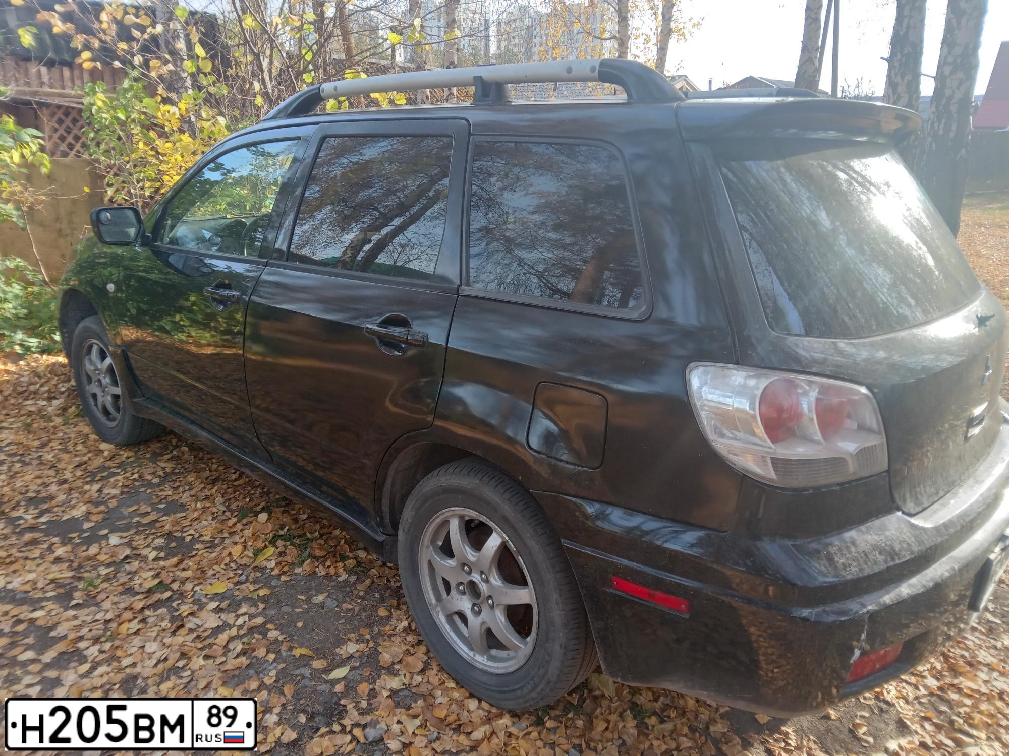 Фото автомобиля MITSUBISHI OUTLANDER, 2003 — госномер К656КА774. Цвет: ЧЕРНЫЙ