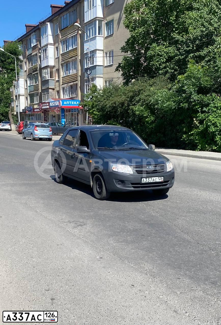 Фото автомобиля LADA 2190 GRANTA, 2014 — госномер А337АС126. Цвет: Серо-Синий