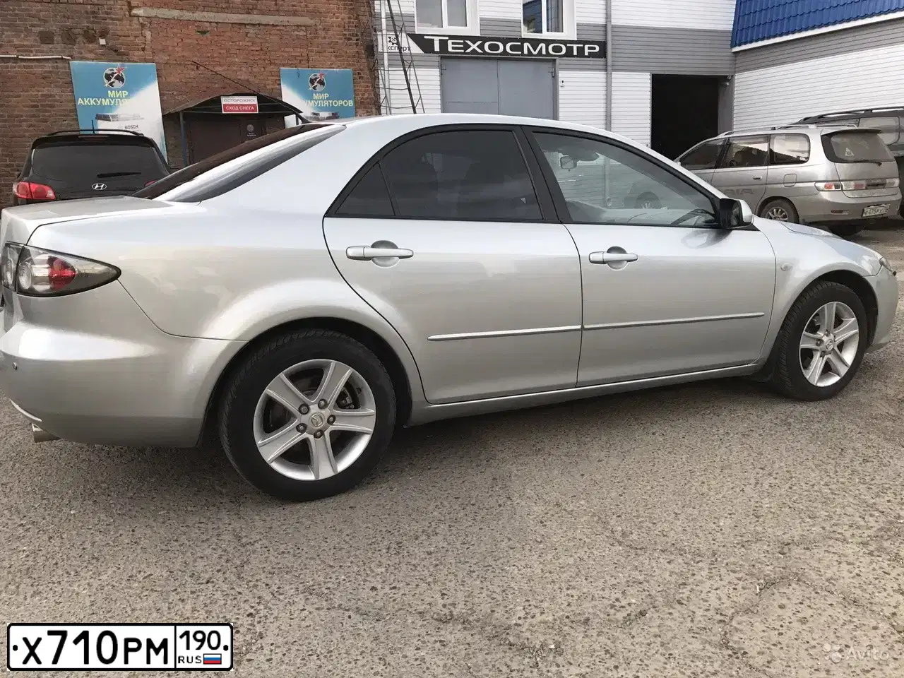 Фото автомобиля MAZDA 6, 2007 — госномер Е935ЕХ70. Цвет: Серый