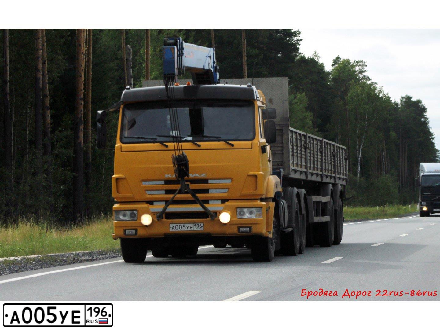 Фото автомобиля KAMAZ 65116 /6X4/, 2012 — госномер А005УЕ196. Цвет: ЖЕЛТЫЙ