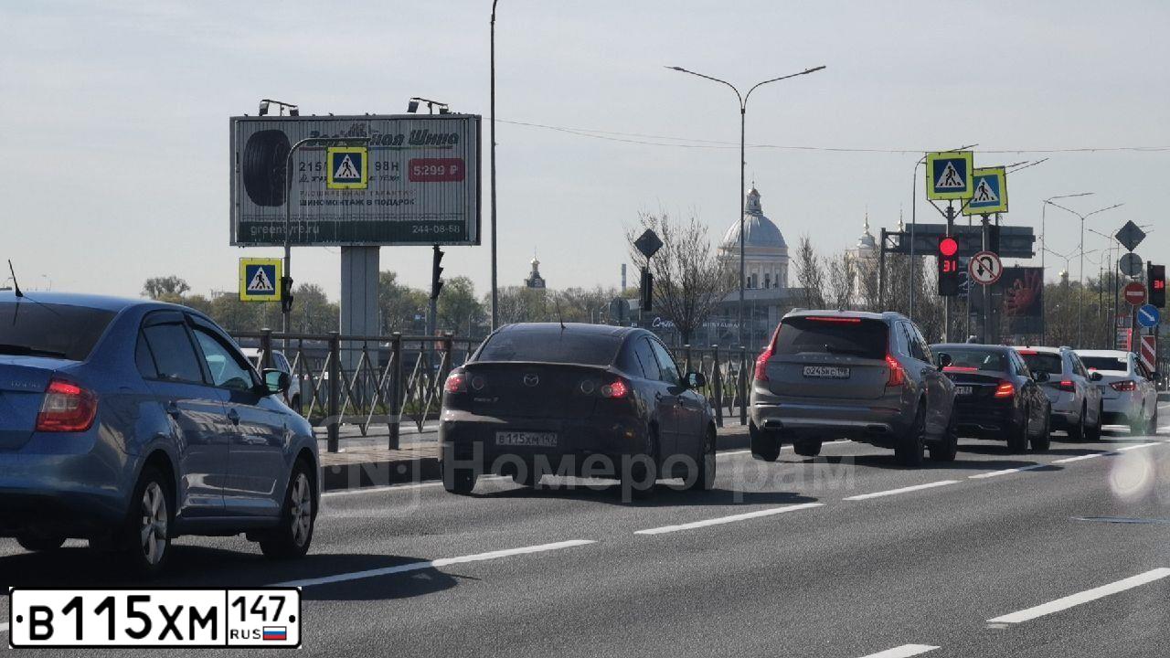 Фото автомобиля MAZDA 3, 2007 — госномер В115ХМ147. Цвет: ТЕМНО-ВИШНЕВЫЙ