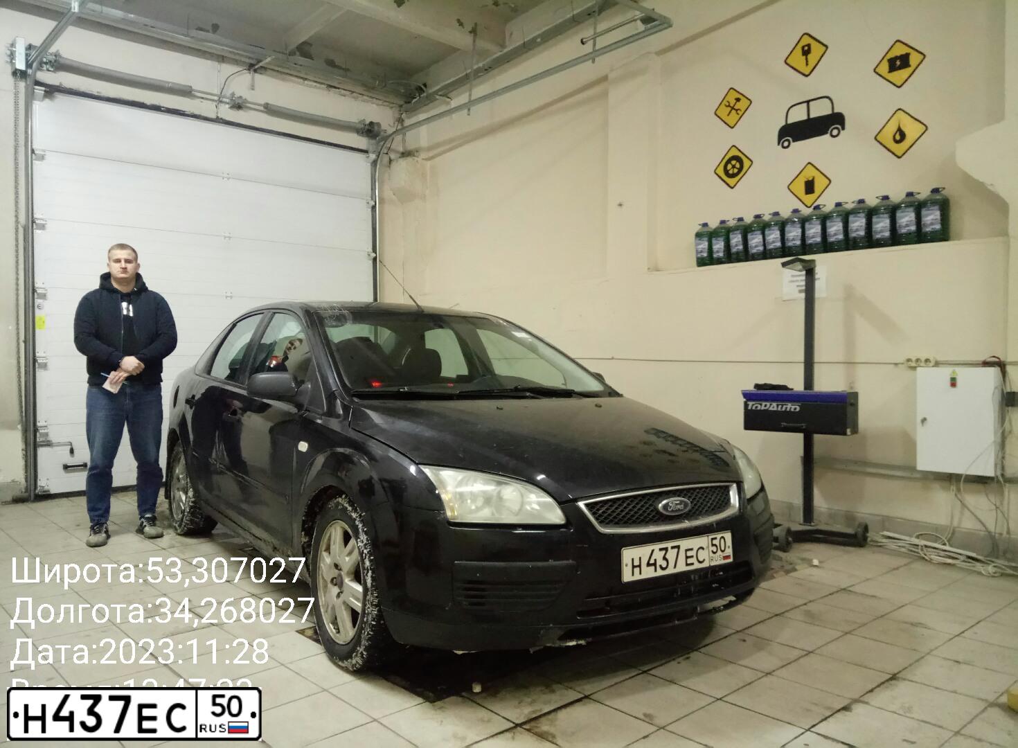 Фото автомобиля FORD FOCUS, 2006 — госномер Р944ВА32. Цвет: ЧЕРНЫЙ