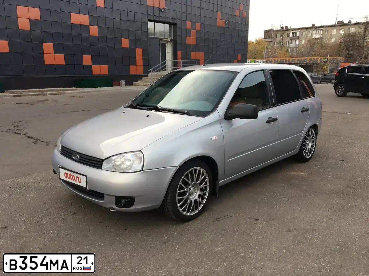 Фото автомобиля LADA 1117 KALINA, 2011 — госномер В354МА21. Цвет: Серебристый