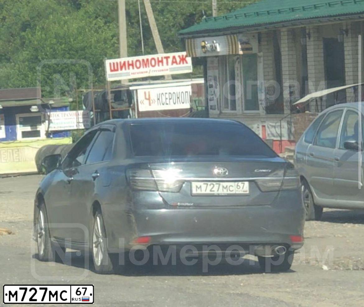 Фото автомобиля RENAULT SANDERO, 2011 — госномер М727МС67. Цвет: ТЕМНО-СЕРЫЙ