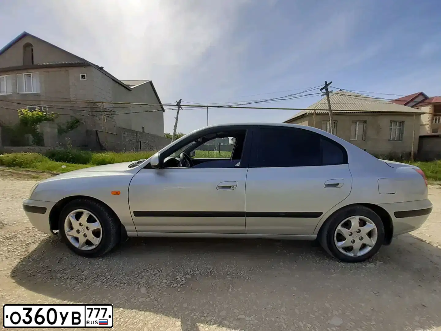 Фото автомобиля HYUNDAI ELANTRA, 2005 — госномер О360УВ777. Цвет: Серебристый