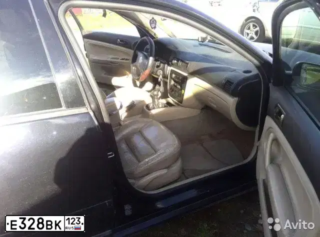 Фото автомобиля VOLKSWAGEN PASSAT, 2000 — госномер Е328ВК123. Цвет: ЧЕРНЫЙ