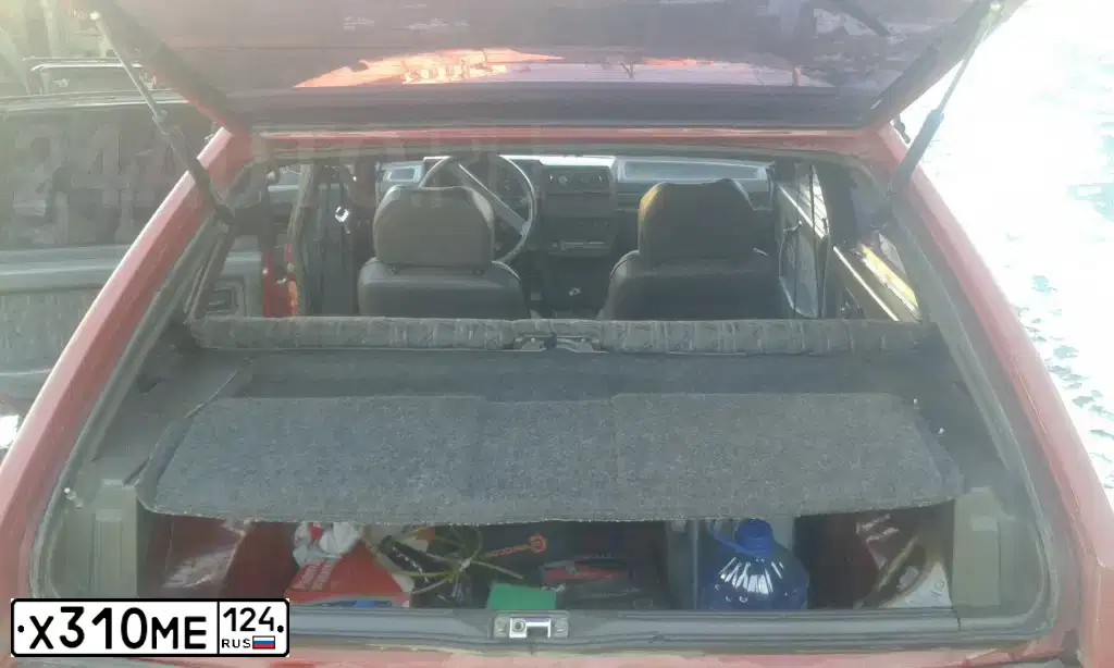 Фото автомобиля LADA 2109 SAMARA, 1998 — госномер Х310МЕ124. Цвет: КРАСНЫЙ