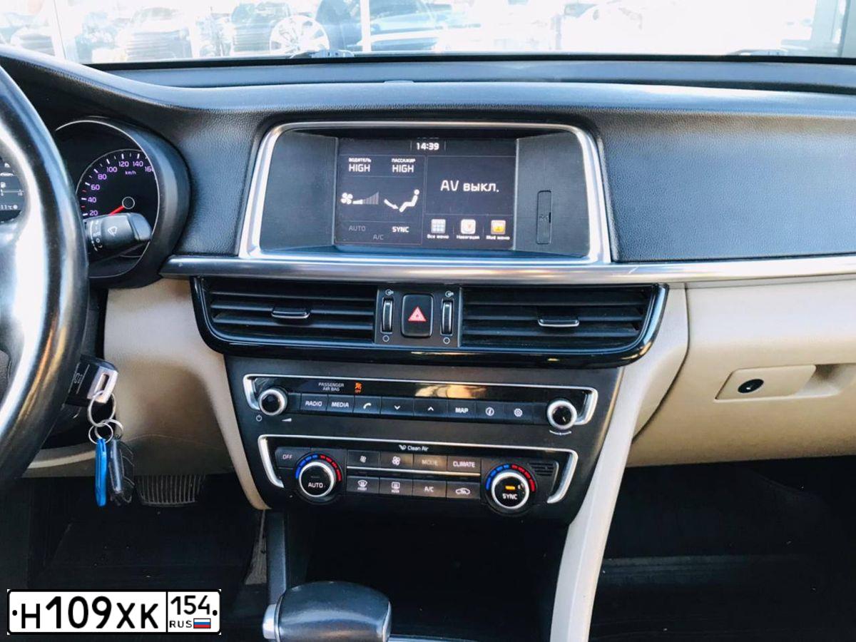 Фото автомобиля KIA MAGENTIS / OPTIMA, 2017 — госномер Е279ЕМ70. Цвет: синий
