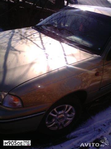 Фото автомобиля DAEWOO O NEXIA, 2005 — госномер М905ОЕ152. Цвет: ЖЕЛТЫЙ