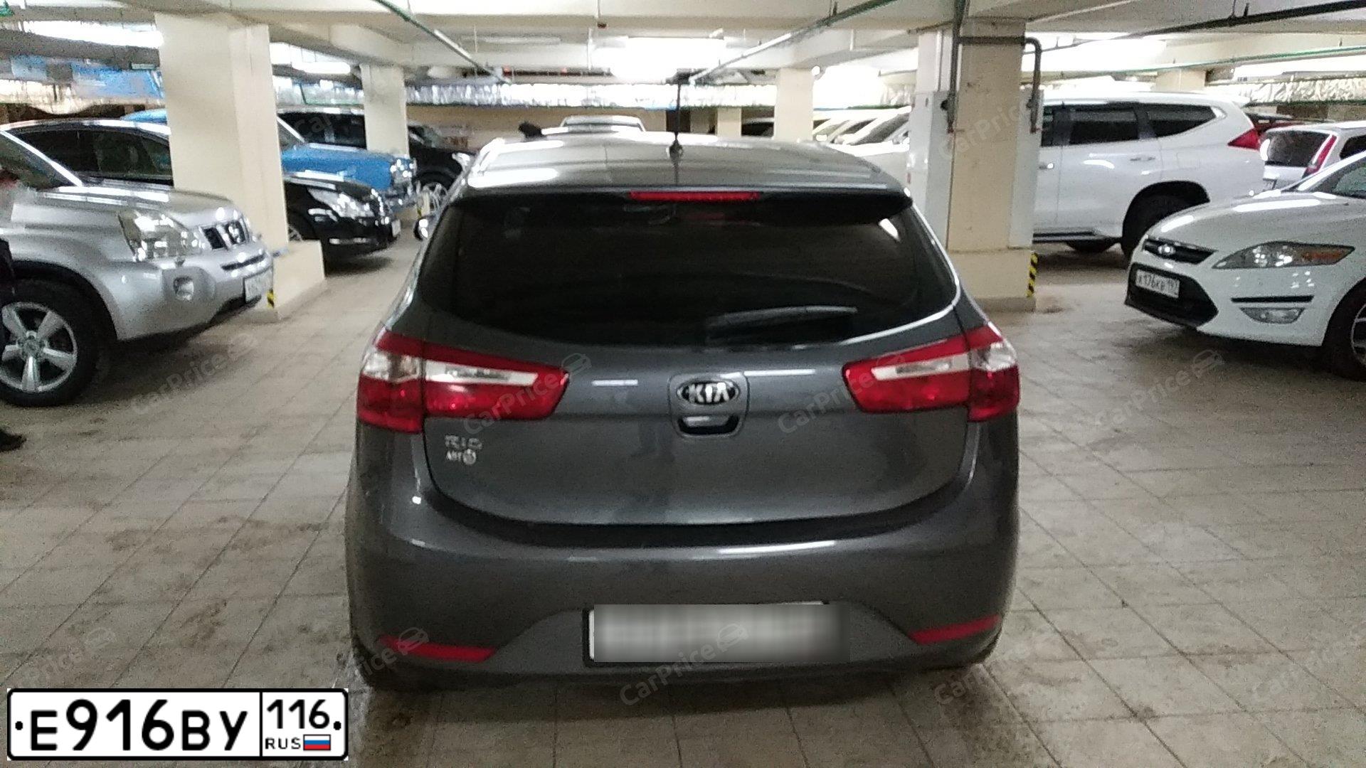 Фото автомобиля KIA RIO, 2014 — госномер Н611МК73. Цвет: СЕРЫЙ