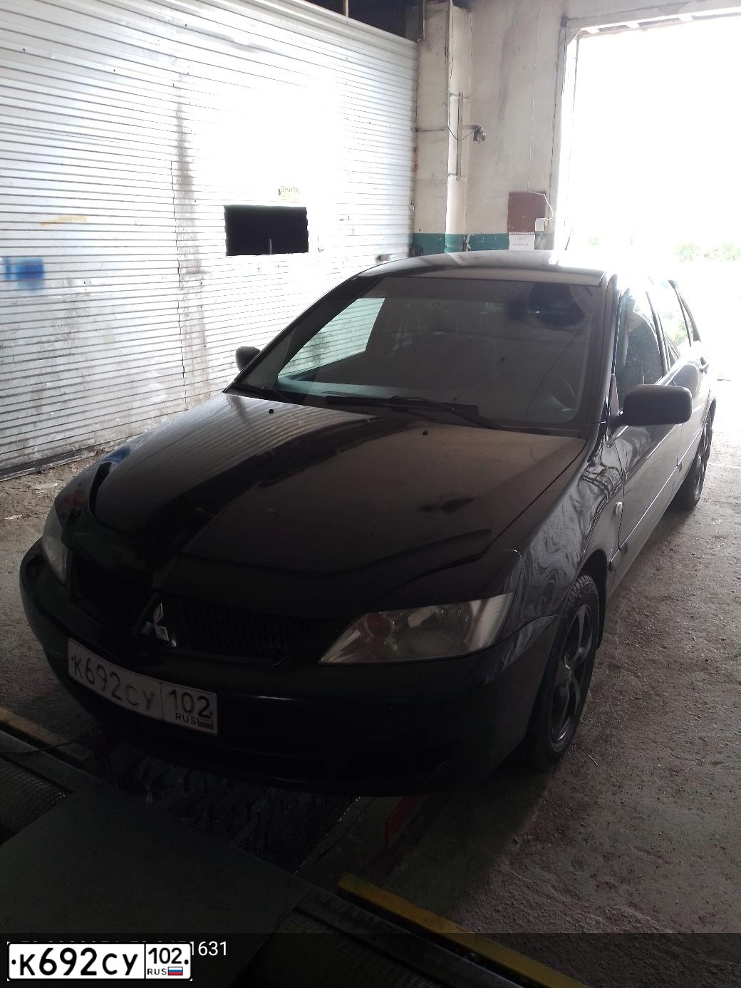 Фото автомобиля MITSUBISHI LANCER, 2006 — госномер К692СУ102. Цвет: ЧЕРНЫЙ