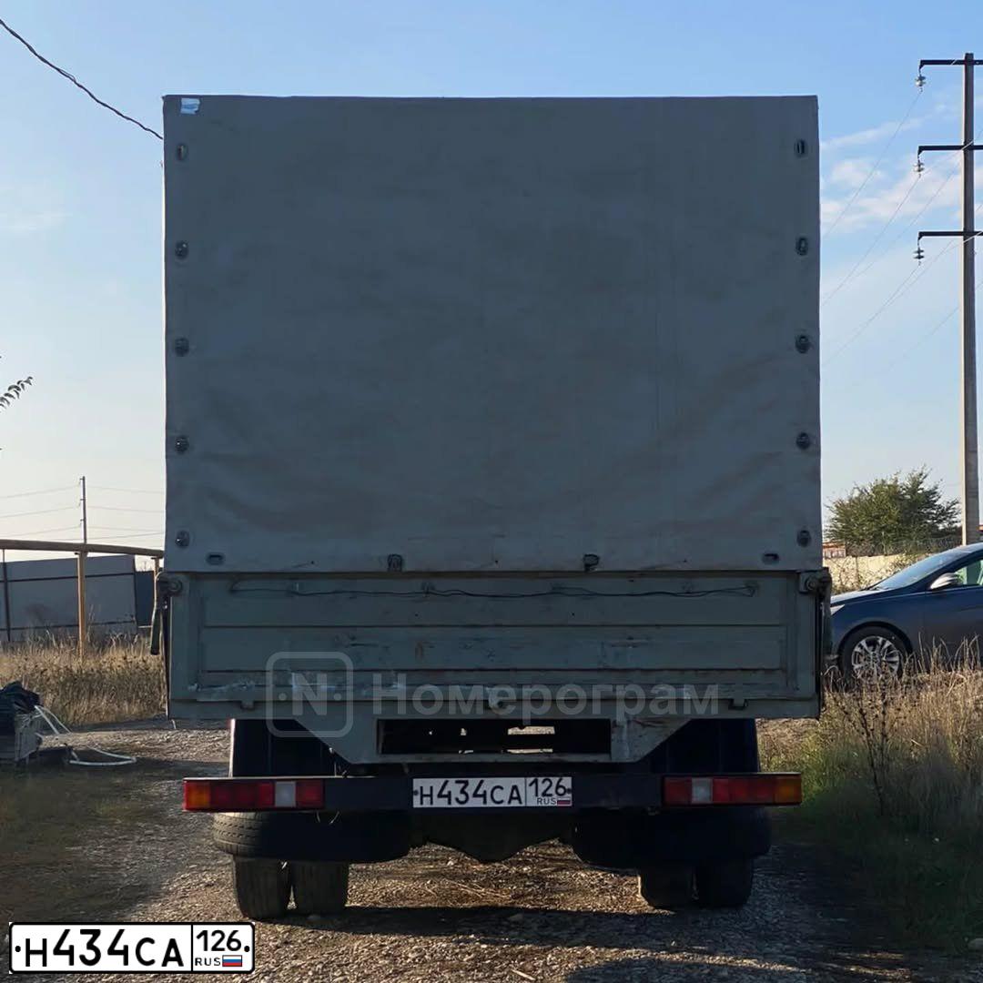 Фото автомобиля GAZ 3302 GAZEL, 2007 — госномер М371ЕС37. Цвет: Белый