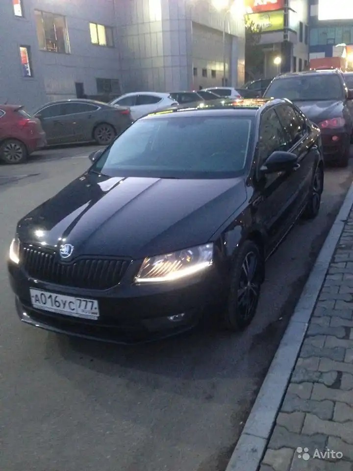 Фото автомобиля SKODA OCTAVIA, 2015 — госномер М704СО35. Цвет: ЧЕРНЫЙ