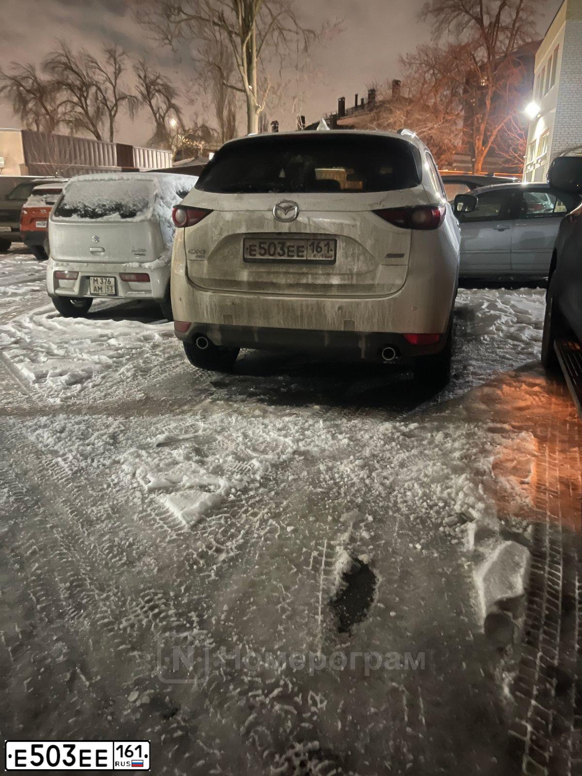 Фото автомобиля MITSUBISHI LANCER, 2013 — госномер Е503ЕЕ161. Цвет: Белый