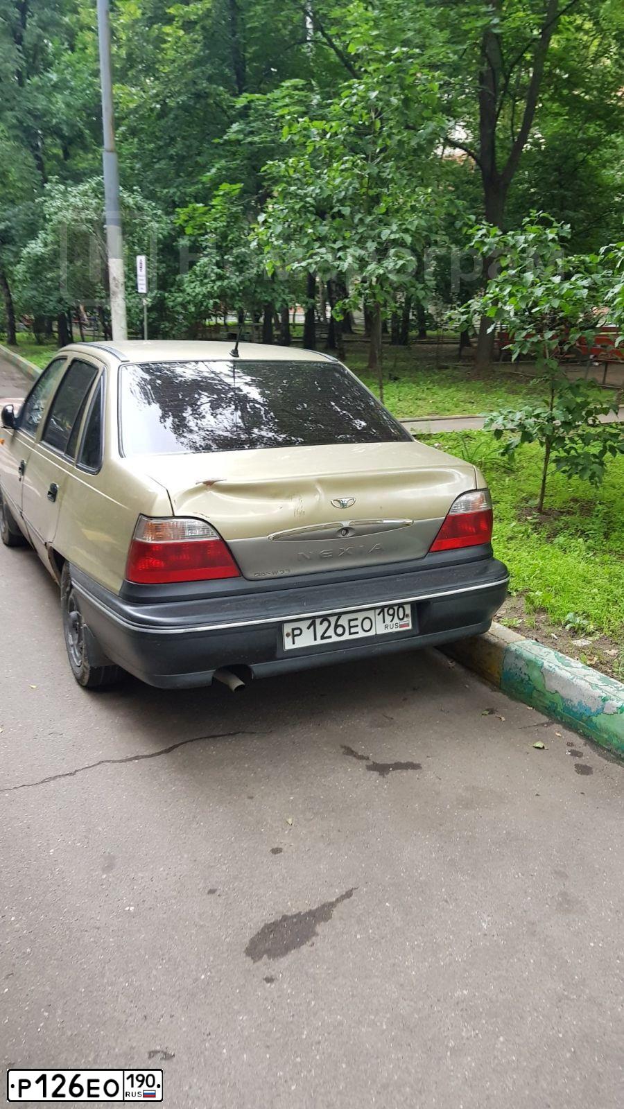 Фото автомобиля DAEWOO NEXIA, 2005 — госномер В680РУ199. Цвет: ЖЕЛТЫЙ (ПЕСОЧНЫЙ)