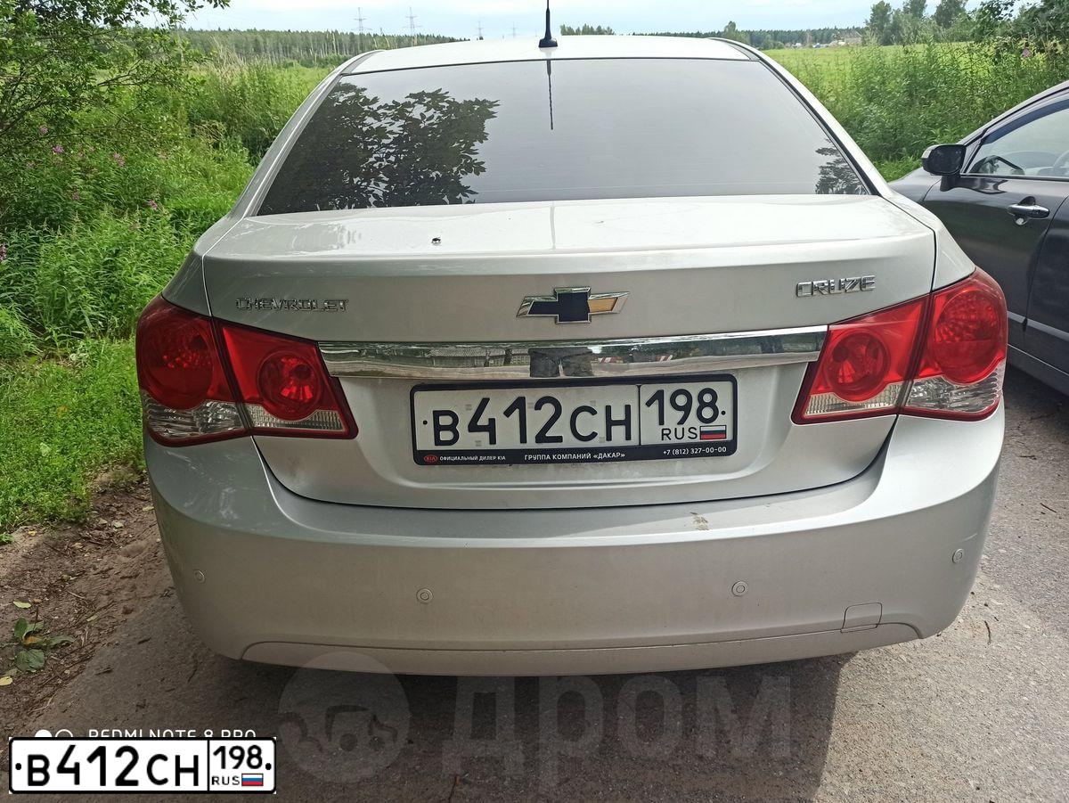 Фото автомобиля CHEVROLET CRUZE, 2010 — госномер В412СН198. Цвет: СЕРЕБРИСТЫЙ МЕТАЛЛИК