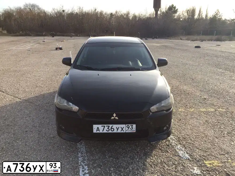 Фото автомобиля MITSUBISHI LANCER, 2007 — госномер К284РН193. Цвет: ЧЕРНЫЙ