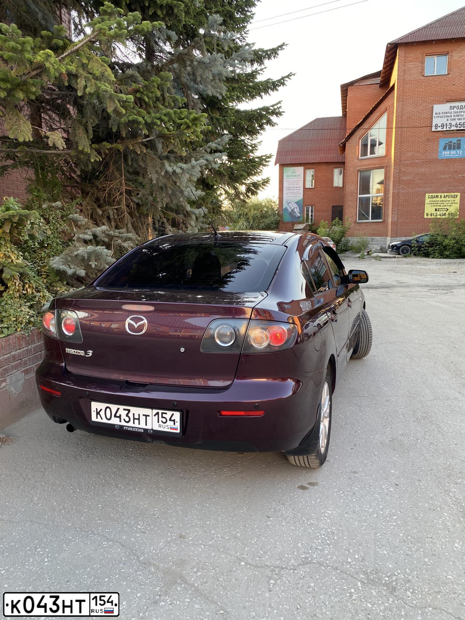Фото автомобиля MAZDA 3, 2006 — госномер К043НТ154. Цвет: ТЕМНО-ВИШНЕВЫЙ