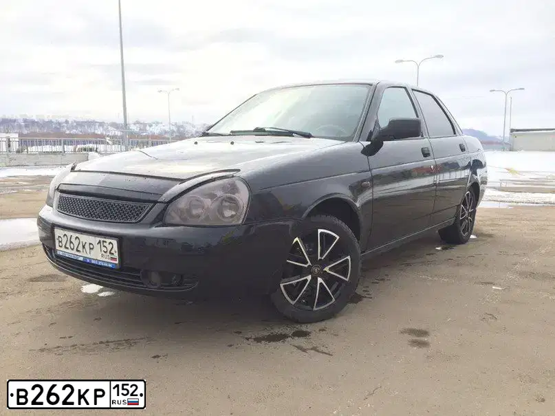 Фото автомобиля LADA 2170 PRIORA, 2010 — госномер Х854УО152. Цвет: Темно-зеленый